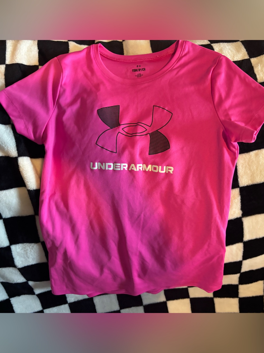 Girls size small pink under armour shirt